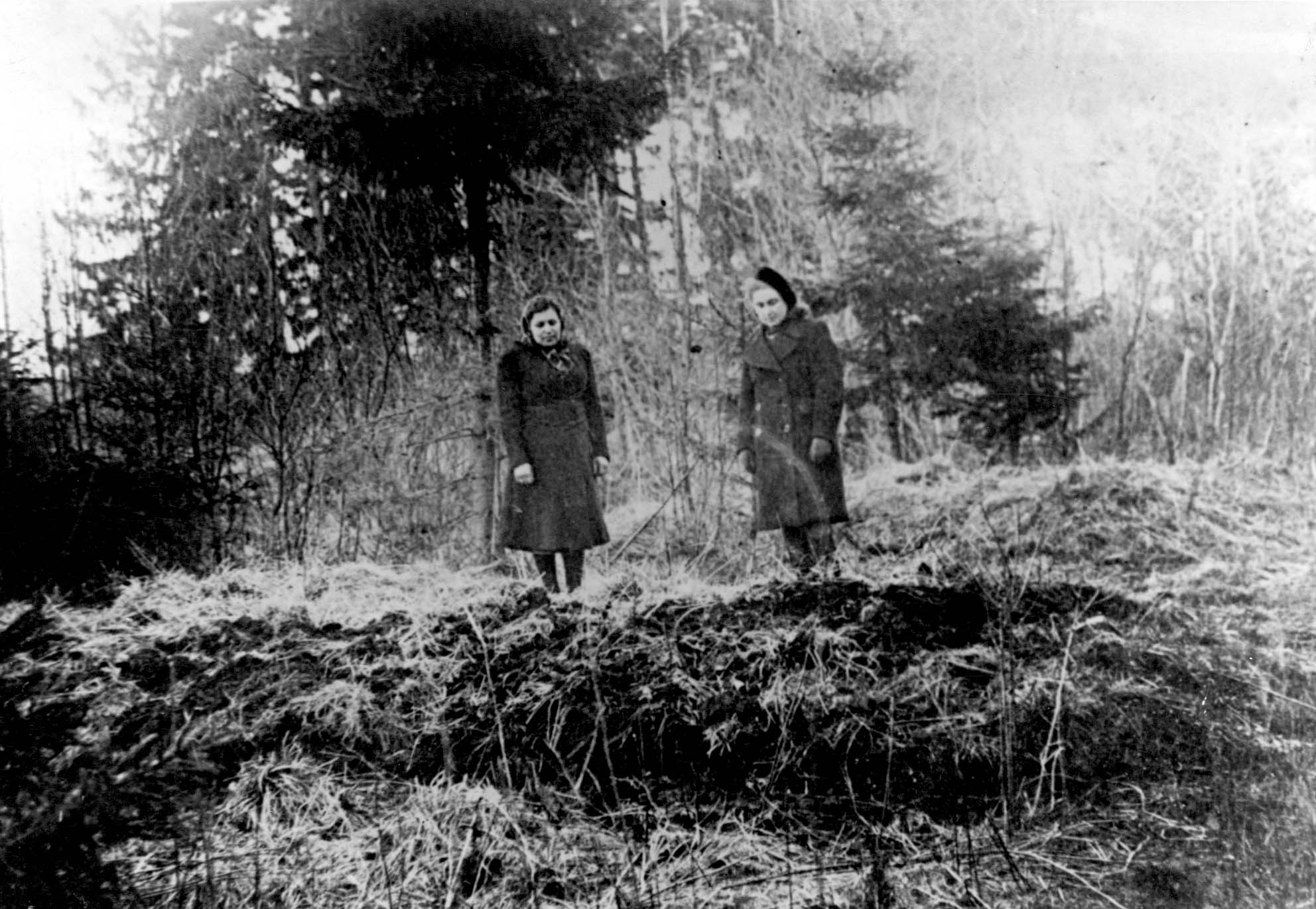 Geruliai. Two women at the site of a mass grave, postwar